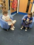 Child reading in the nursery