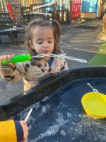 Child blowing bubbles