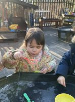 Child blowing bubbles