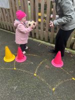 Child catching a large ball