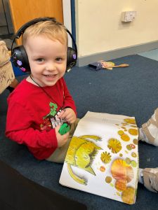 Child reading in the nursery