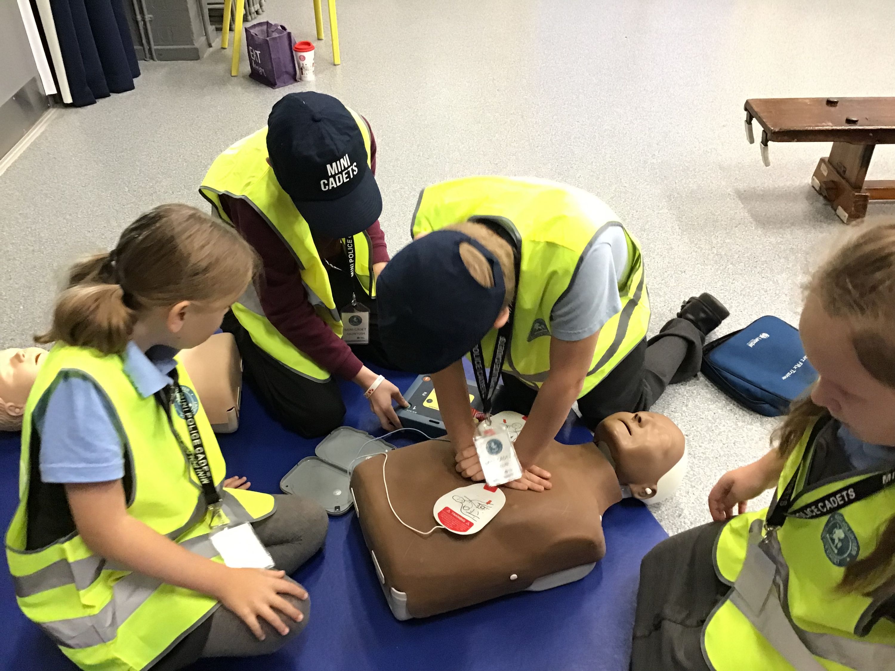 Children Practicing CPR