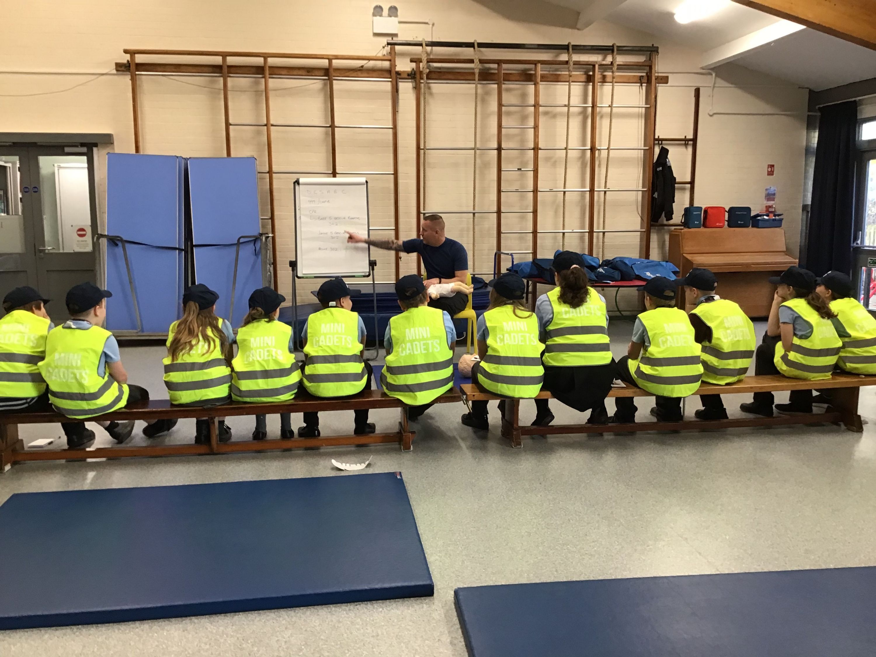 Pupils being taught on a whiteboard 