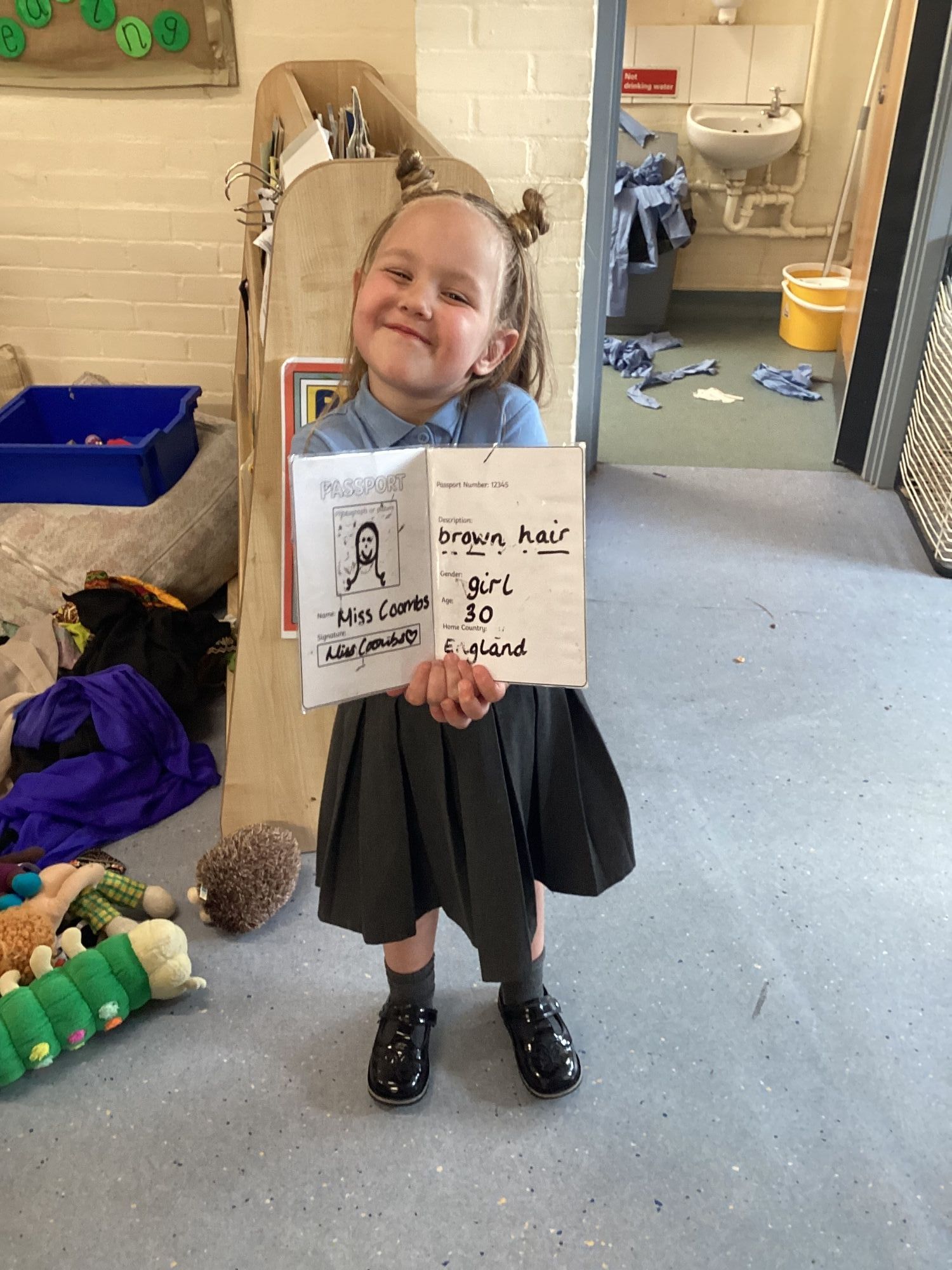 Child holding a picture up